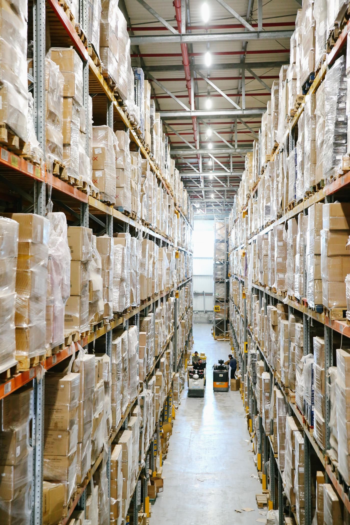 Organized warehouse shelves with boxed product inventory